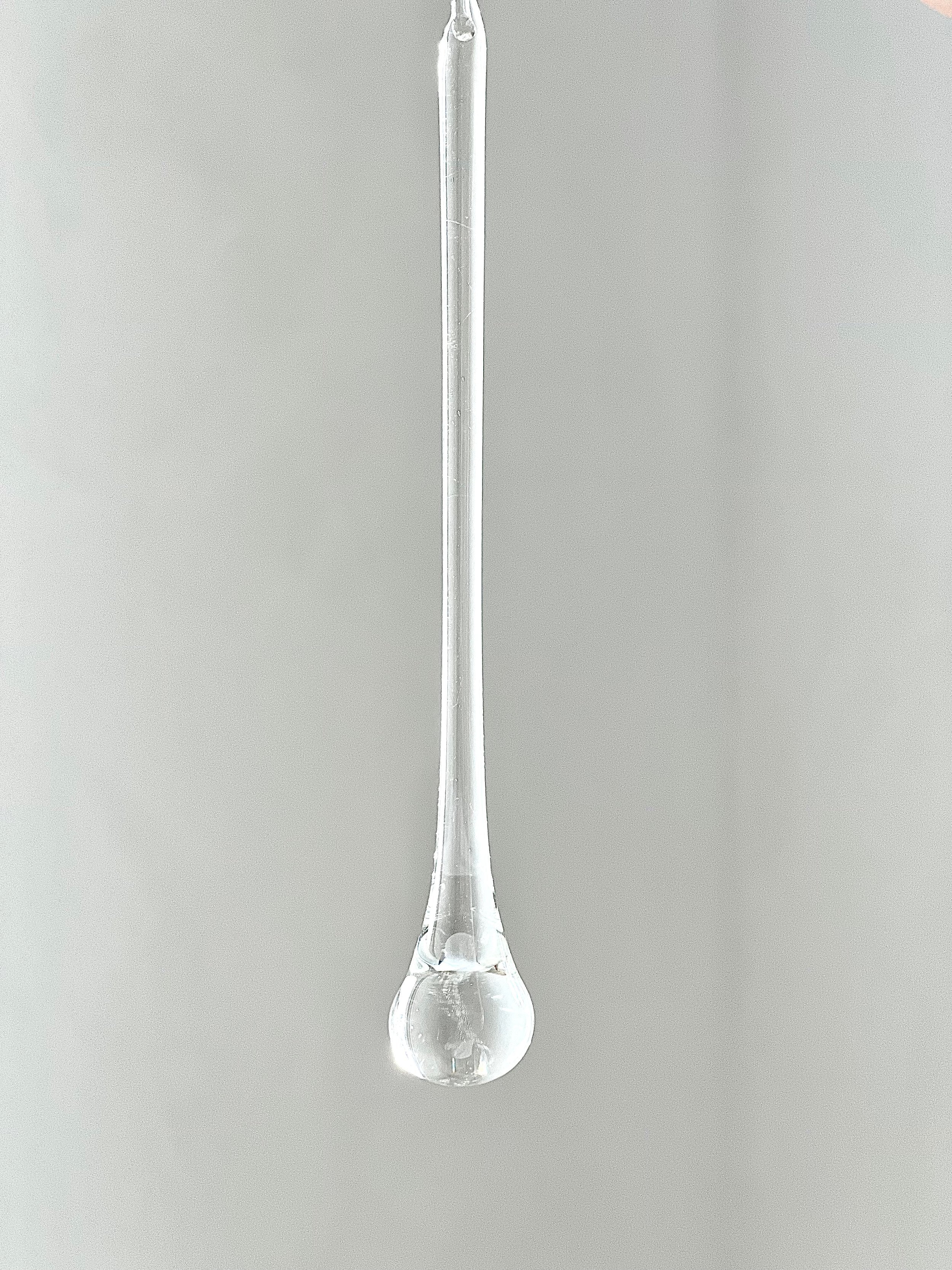 Tear drop shaped, organically hand blown glass icicles.