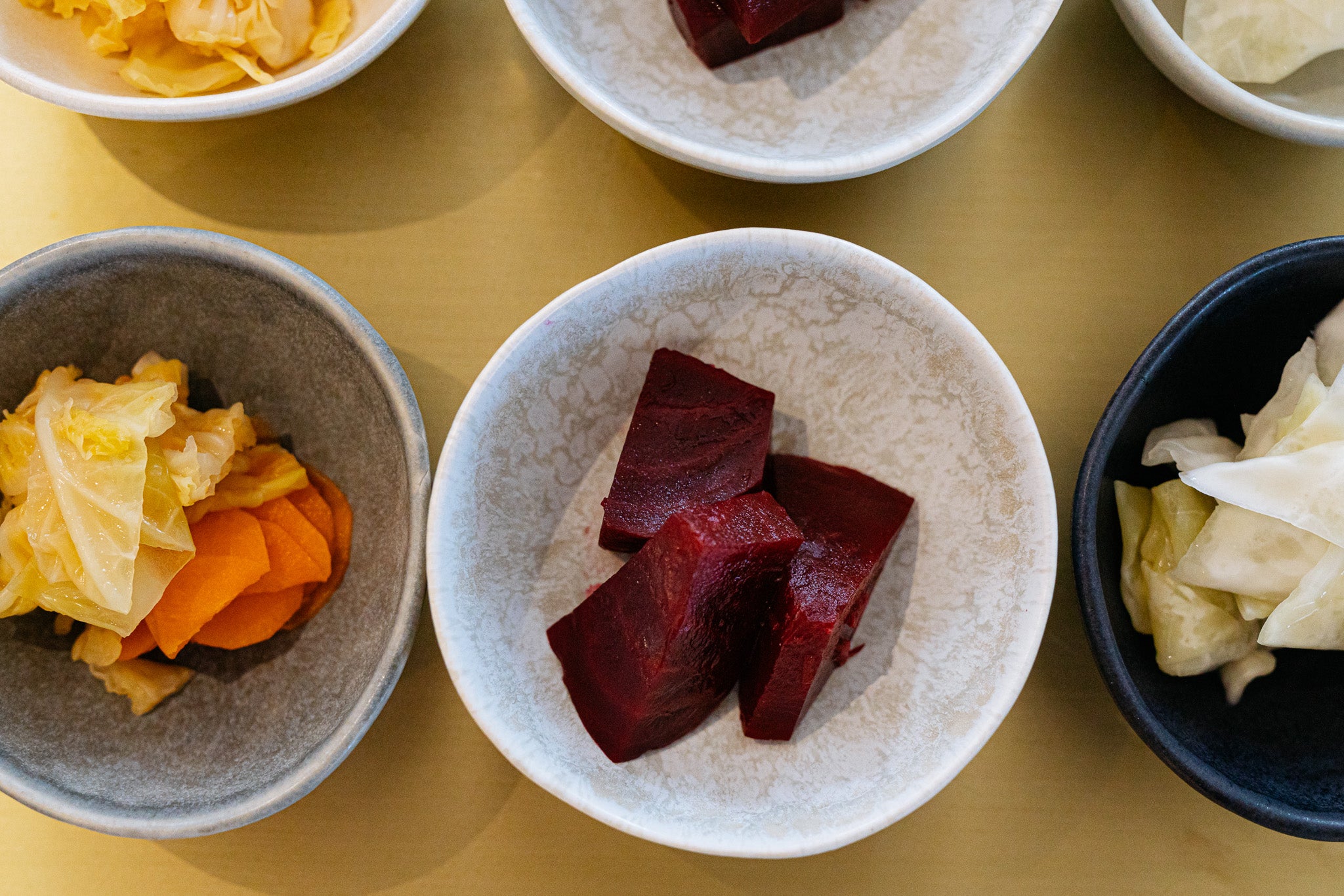 various bowls containing various vegetables