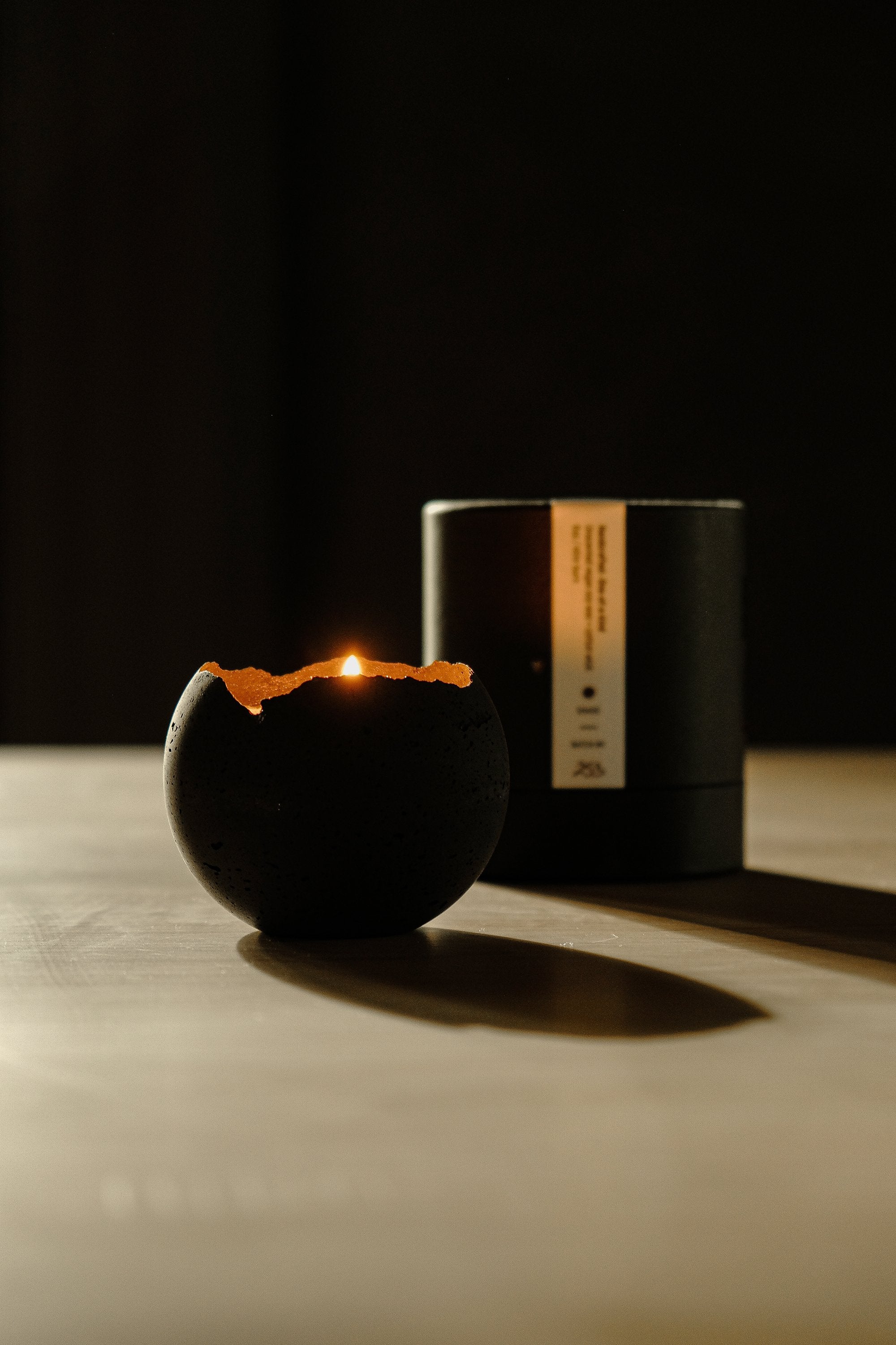 concrete moon shaped candle